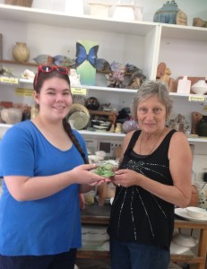 Bribie Islands Potters donate a frog satute